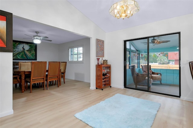 990 Sea Fox Rd, Venice, FL 34293 - interior space featuring ceiling fan with notable chandelier, baseboards, and wood finished floors