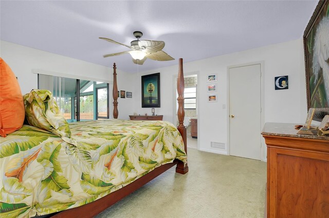 990 Sea Fox Rd, Venice, FL 34293 - bedroom featuring access to outside, ceiling fan, and visible vents
