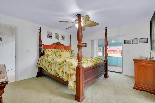 990 Sea Fox Rd, Venice, FL 34293 - bedroom with light colored carpet, baseboards, and ceiling fan
