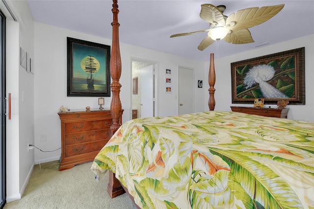 990 Sea Fox Rd, Venice, FL 34293 - bedroom with ceiling fan, ensuite bath, visible vents, light carpet, and baseboards