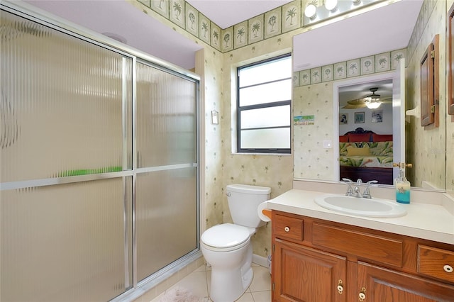 990 Sea Fox Rd, Venice, FL 34293 - bathroom featuring a shower stall, wallpapered walls, ensuite bath, and toilet