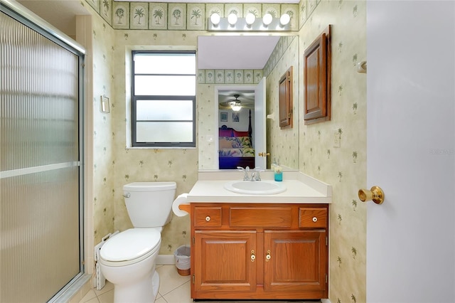 990 Sea Fox Rd, Venice, FL 34293 - ensuite bathroom with ensuite bathroom, a shower stall, tile patterned flooring, and wallpapered walls