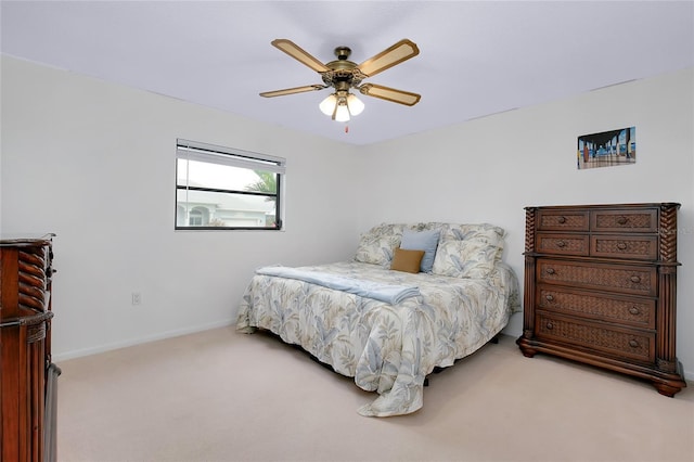 990 Sea Fox Rd, Venice, FL 34293 - carpeted bedroom featuring baseboards and ceiling fan