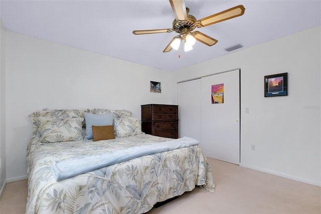 990 Sea Fox Rd, Venice, FL 34293 - carpeted bedroom featuring a closet, baseboards, a ceiling fan, and visible vents