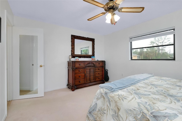 990 Sea Fox Rd, Venice, FL 34293 - carpeted bedroom featuring a ceiling fan