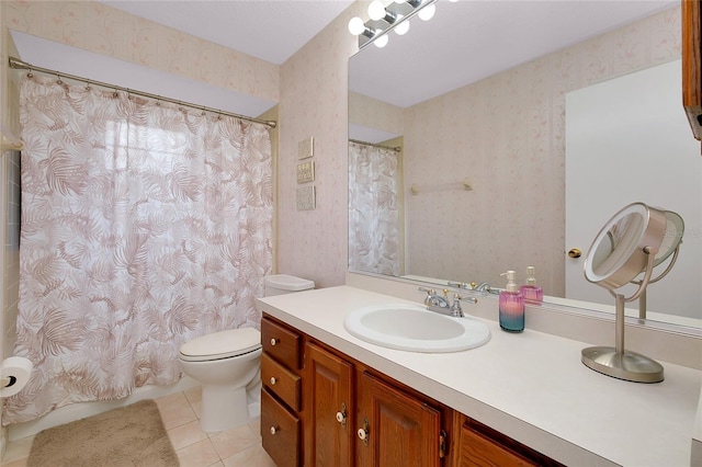 990 Sea Fox Rd, Venice, FL 34293 - bathroom featuring toilet, tile patterned floors, and wallpapered walls