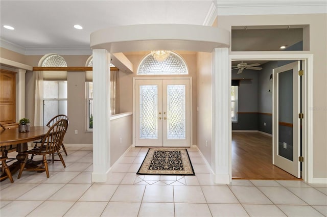 201 Bayside Ct, Nokomis, FL 34275 - entryway with ceiling fan, baseboards, french doors, and light tile patterned floors