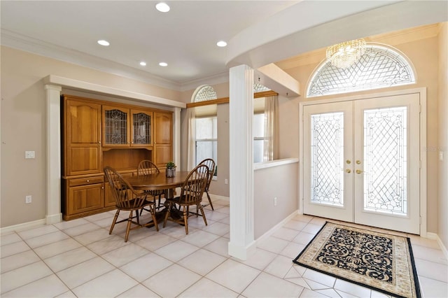 201 Bayside Ct, Nokomis, FL 34275 - foyer featuring crown molding, french doors, baseboards, a notable chandelier, and recessed lighting