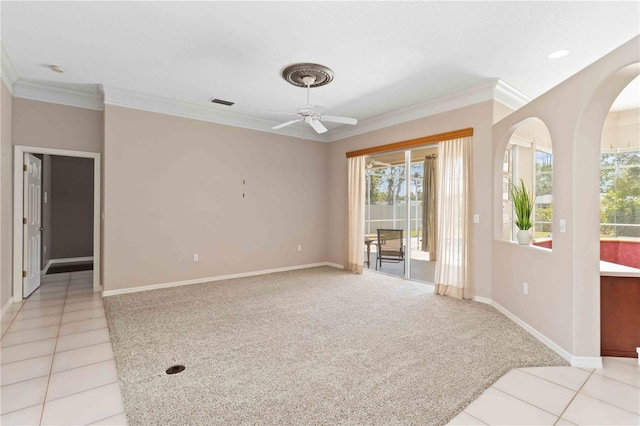 201 Bayside Ct, Nokomis, FL 34275 - unfurnished room with light carpet, baseboards, ornamental molding, ceiling fan, and light tile patterned floors