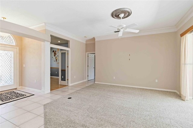 201 Bayside Ct, Nokomis, FL 34275 - interior space with ceiling fan, baseboards, ornamental molding, and light tile patterned floors