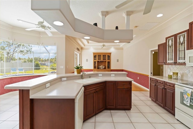 201 Bayside Ct, Nokomis, FL 34275 - kitchen featuring ornamental molding, a ceiling fan, a sink, and white appliances