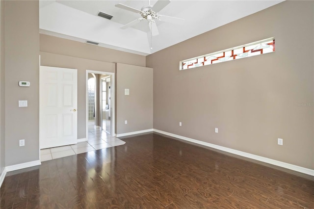201 Bayside Ct, Nokomis, FL 34275 - empty room featuring baseboards, wood finished floors, visible vents, and a ceiling fan