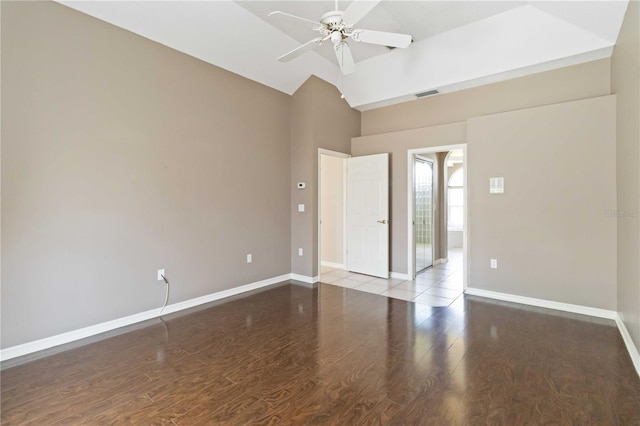 201 Bayside Ct, Nokomis, FL 34275 - empty room with high vaulted ceiling, a ceiling fan, wood finished floors, baseboards, and visible vents