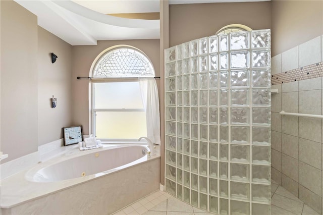 201 Bayside Ct, Nokomis, FL 34275 - full bathroom featuring tile patterned flooring, a tub with jets, and a walk in shower