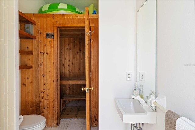 201 Bayside Ct, Nokomis, FL 34275 - half bath with toilet, tile patterned flooring, a sink, and a sauna