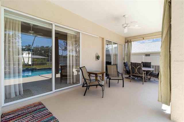 201 Bayside Ct, Nokomis, FL 34275 - sunroom / solarium with carpet floors and ceiling fan