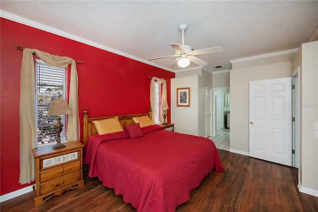 bedroom featuring a ceiling fan, baseboards, ornamental molding, and wood finished floors