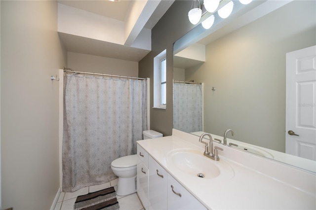 full bathroom featuring toilet, tile patterned flooring, and vanity