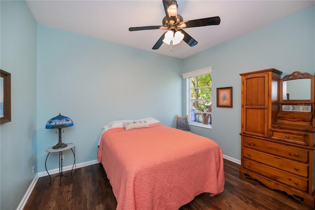 bedroom with baseboards, a ceiling fan, and wood finished floors