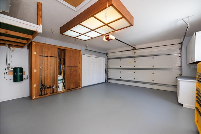 garage featuring a garage door opener