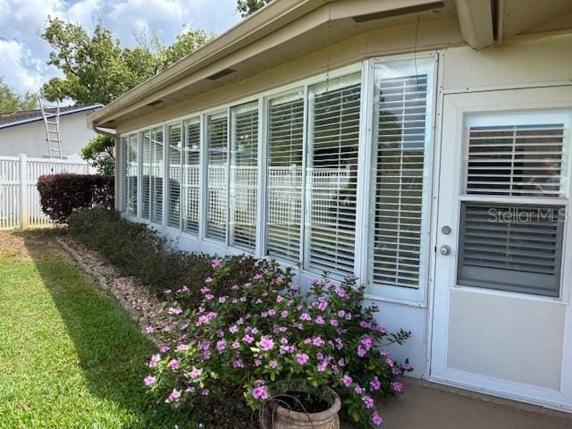 810 Anchorage Ln, Palm Harbor, FL 34685 - exterior view of stucco siding