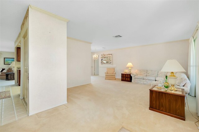 810 Anchorage Ln, Palm Harbor, FL 34685 - living area with carpet flooring, a chandelier, and crown molding