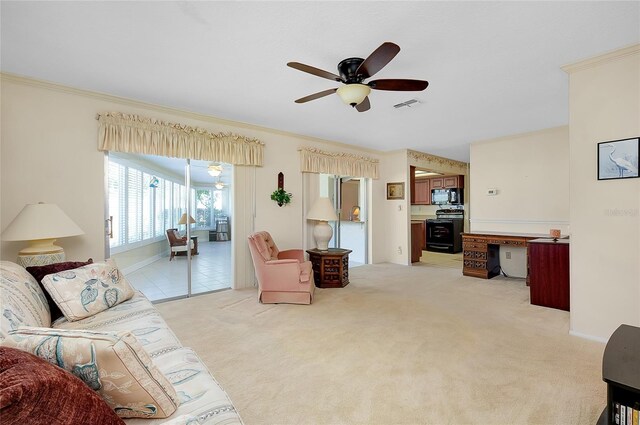 810 Anchorage Ln, Palm Harbor, FL 34685 - living room featuring ceiling fan, ornamental molding, and light carpet