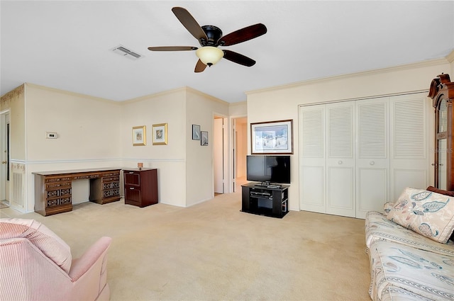 810 Anchorage Ln, Palm Harbor, FL 34685 - living area with a ceiling fan, ornamental molding, and carpet