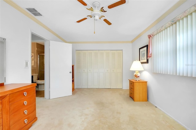 810 Anchorage Ln, Palm Harbor, FL 34685 - unfurnished bedroom with crown molding, light carpet, a closet, and ceiling fan