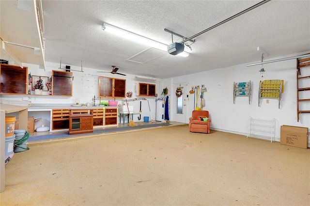 810 Anchorage Ln, Palm Harbor, FL 34685 - garage with a workshop area and a garage door opener