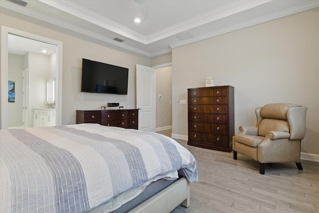 bedroom featuring recessed lighting, light wood-style floors, baseboards, and crown molding