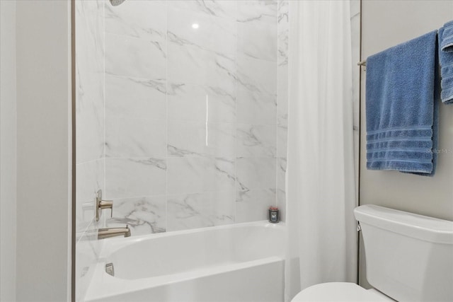 full bathroom with toilet and shower / tub combo with curtain