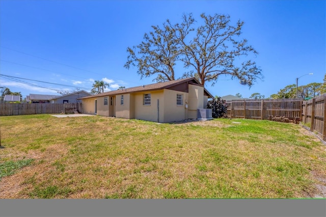 5755 Oxalis Rd, Venice, FL 34293 - view of yard featuring a fenced backyard and cooling unit