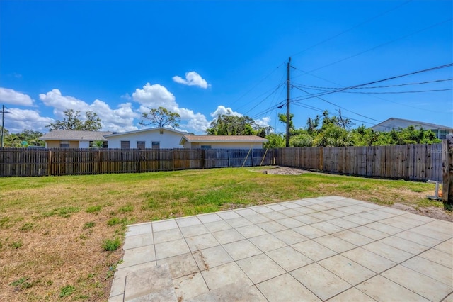 5755 Oxalis Rd, Venice, FL 34293 - view of yard with a fenced backyard and a patio