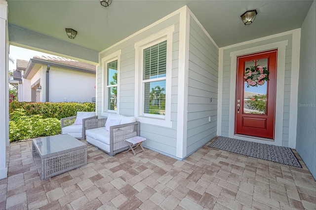 doorway to property with covered porch