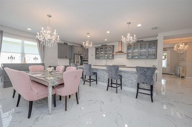 dining area with visible vents, recessed lighting, and a chandelier