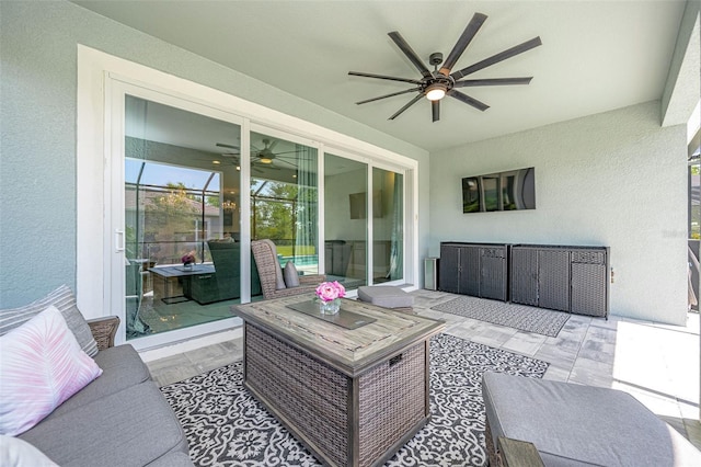 view of patio / terrace with outdoor lounge area and ceiling fan