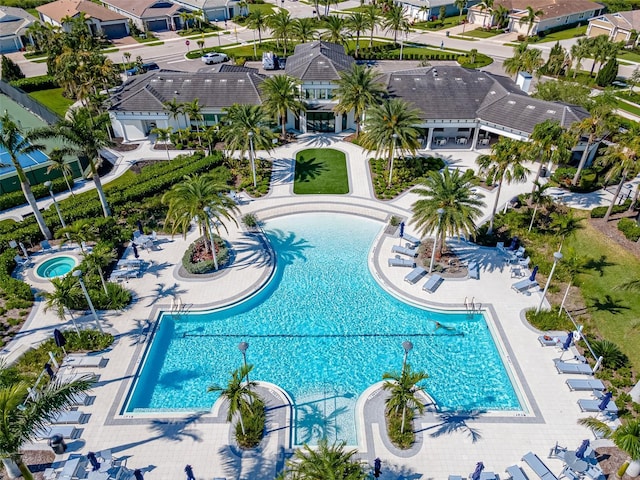 view of swimming pool with a residential view