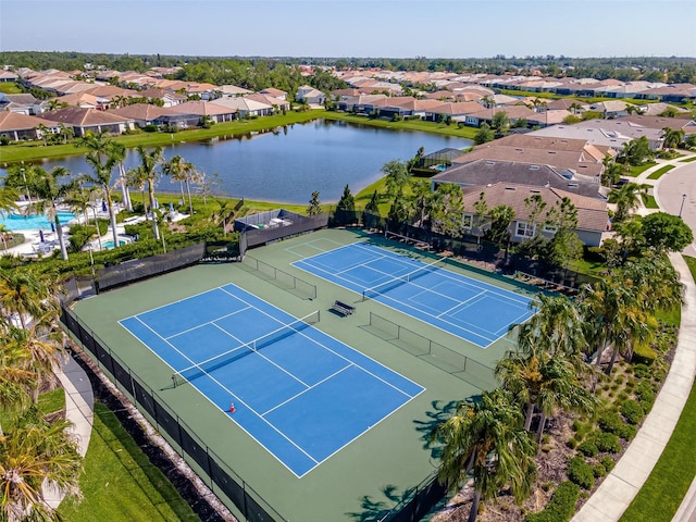 bird's eye view with a water view and a residential view