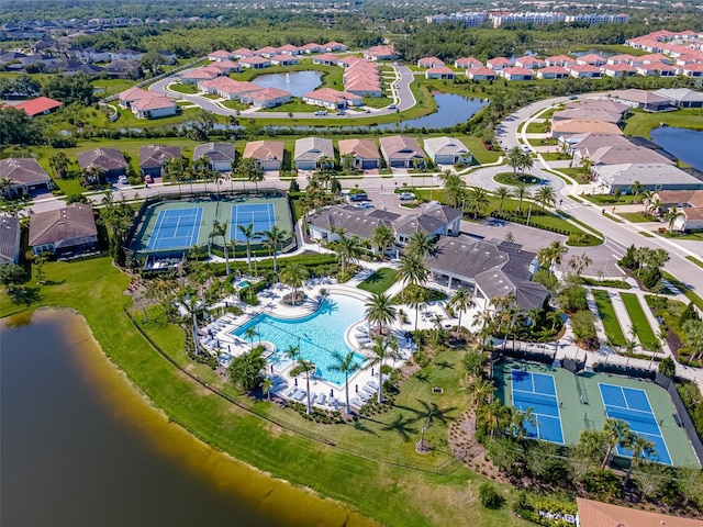 aerial view with a water view and a residential view