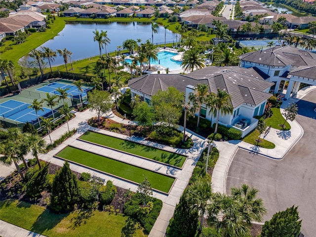 bird's eye view with a residential view and a water view
