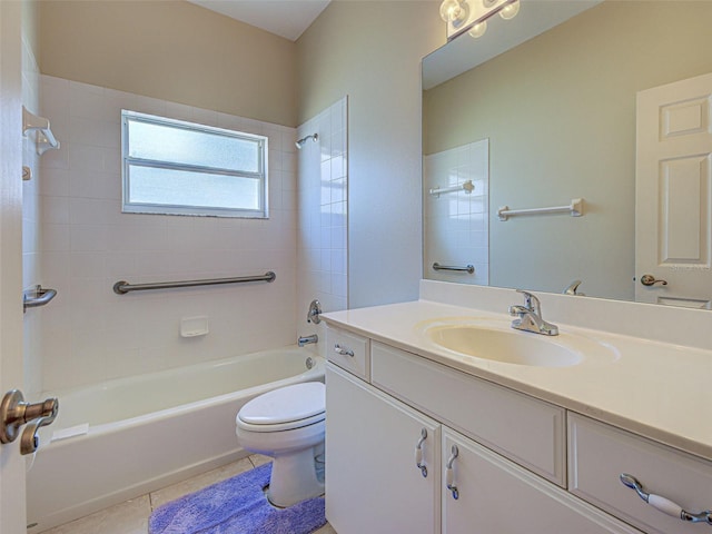 full bathroom featuring toilet, bathtub / shower combination, vanity, and tile patterned floors