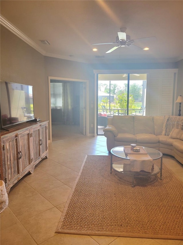 20188 Tesoro Dr, Venice, FL 34293 - living area with light tile patterned floors, ornamental molding, ceiling fan, and recessed lighting