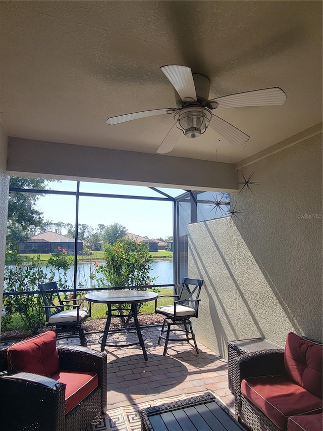 20188 Tesoro Dr, Venice, FL 34293 - sunroom / solarium featuring a water view and ceiling fan