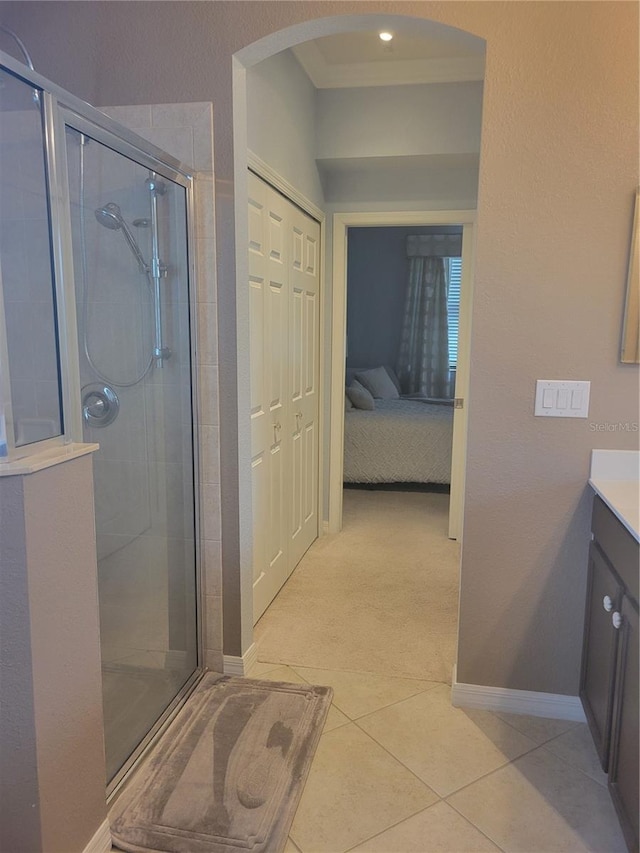 20188 Tesoro Dr, Venice, FL 34293 - bathroom with vanity, a stall shower, ensuite bath, and tile patterned flooring