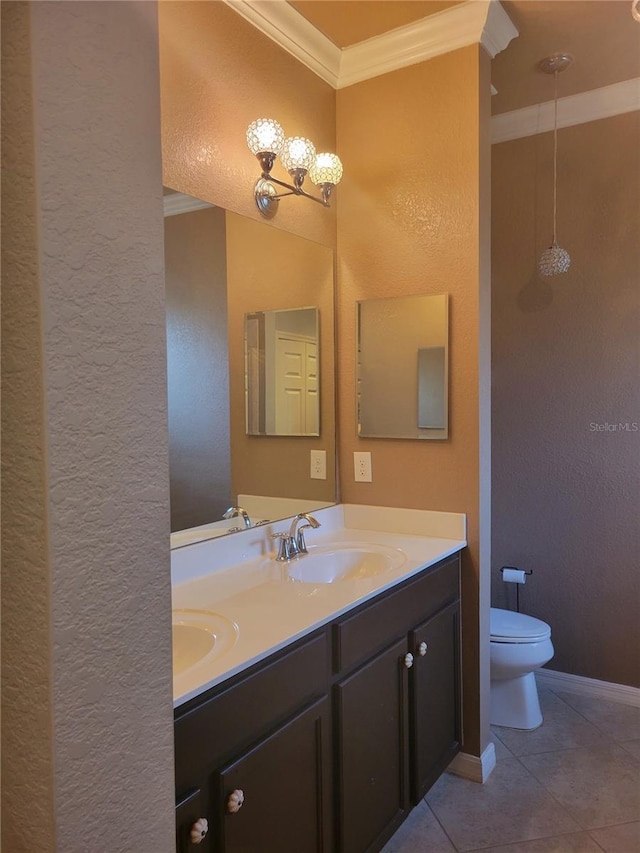 20188 Tesoro Dr, Venice, FL 34293 - bathroom featuring a textured wall, crown molding, double vanity, tile patterned flooring, and a chandelier