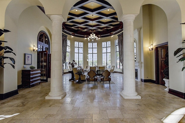 20188 Tesoro Dr, Venice, FL 34293 - community lobby featuring a towering ceiling, coffered ceiling, beamed ceiling, and recessed lighting