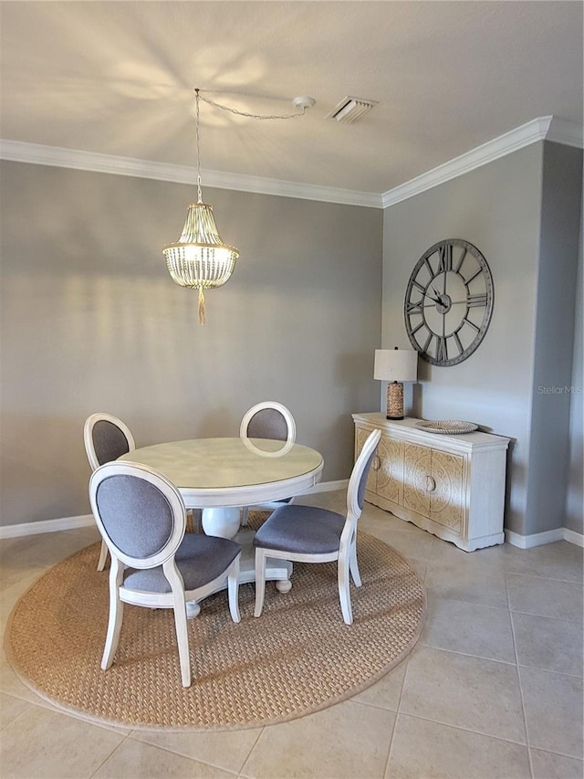 20188 Tesoro Dr, Venice, FL 34293 - dining area featuring crown molding and light tile patterned flooring