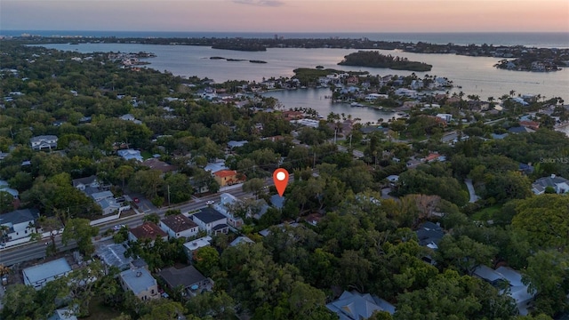 1629 Siesta Dr, Sarasota, FL 34239 - aerial view at dusk featuring a water view