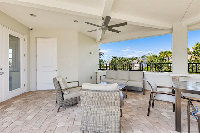 view of patio with an outdoor hangout area and a ceiling fan